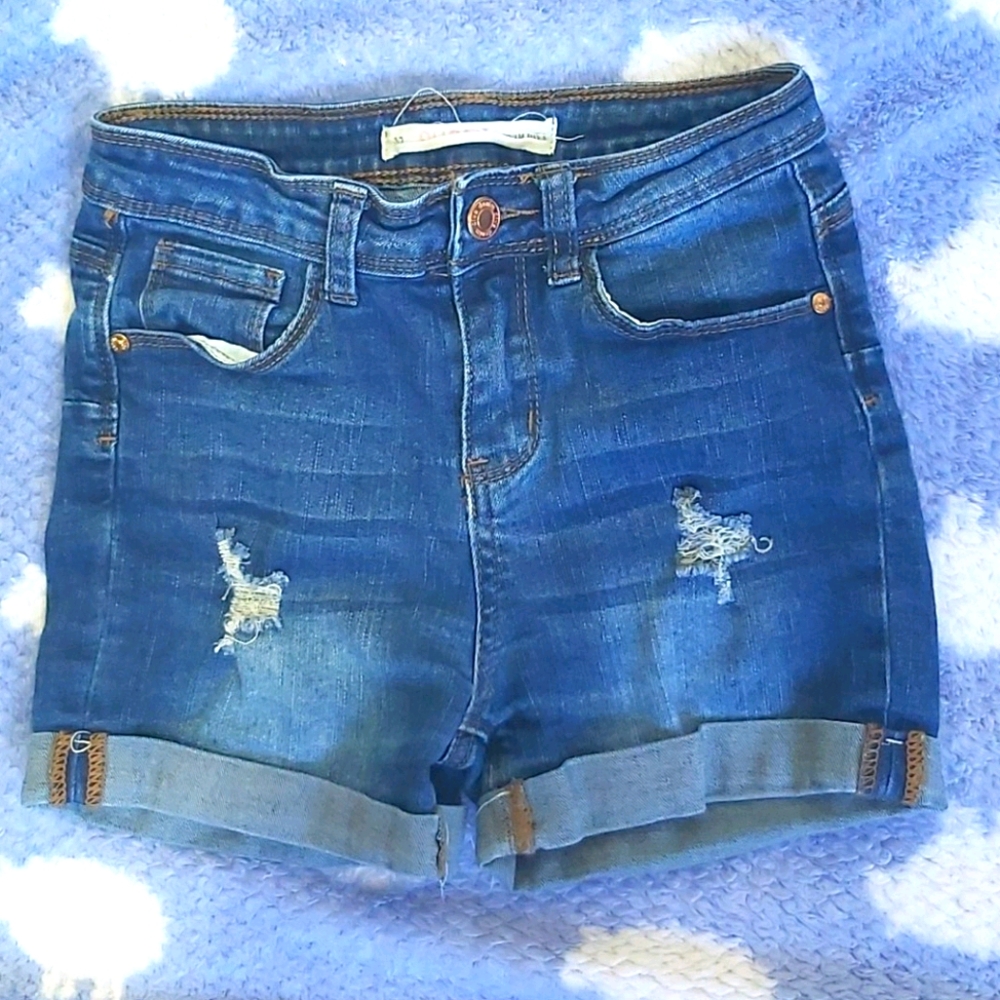 Girls rip jean shorts.